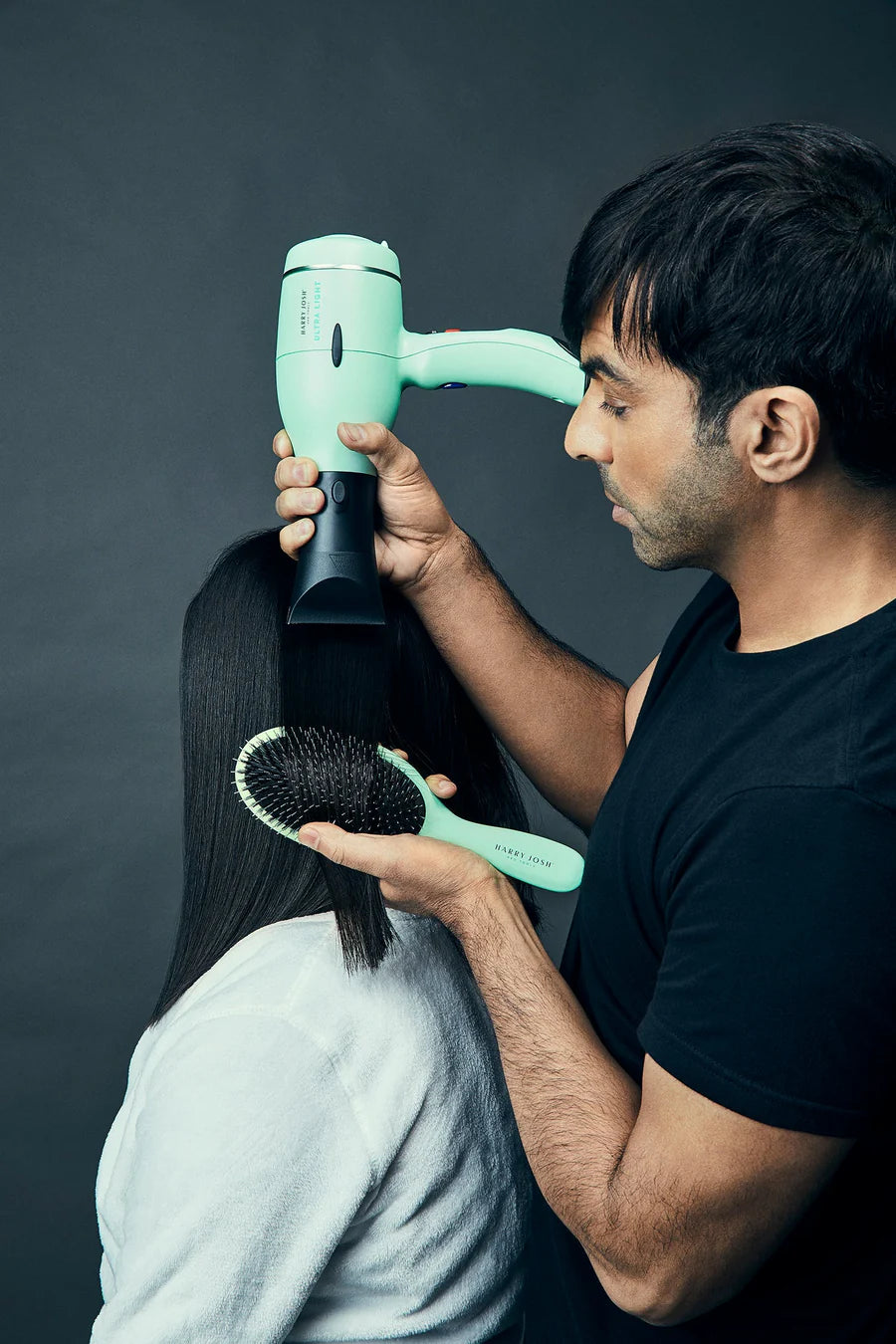 Harry Josh styling hair with his Harry Josh Pro Dryer 2000